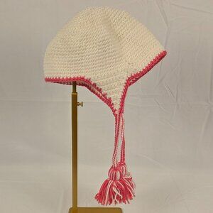 Vintage Handmade crochet baby/toddler hat – cream with pink trim and tassels.